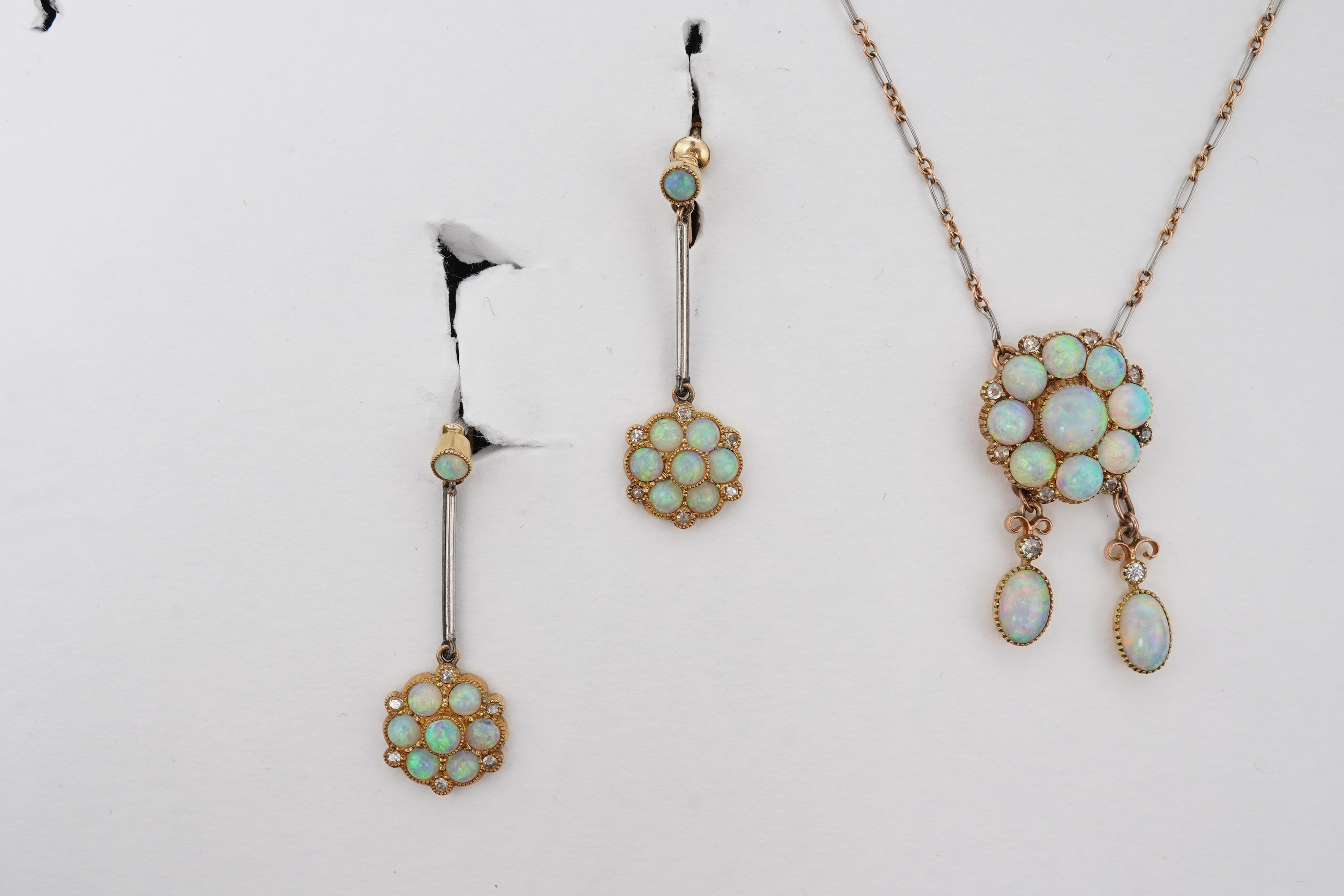 An attractive Edwardian opal and diamond demi-parure, early 20th century